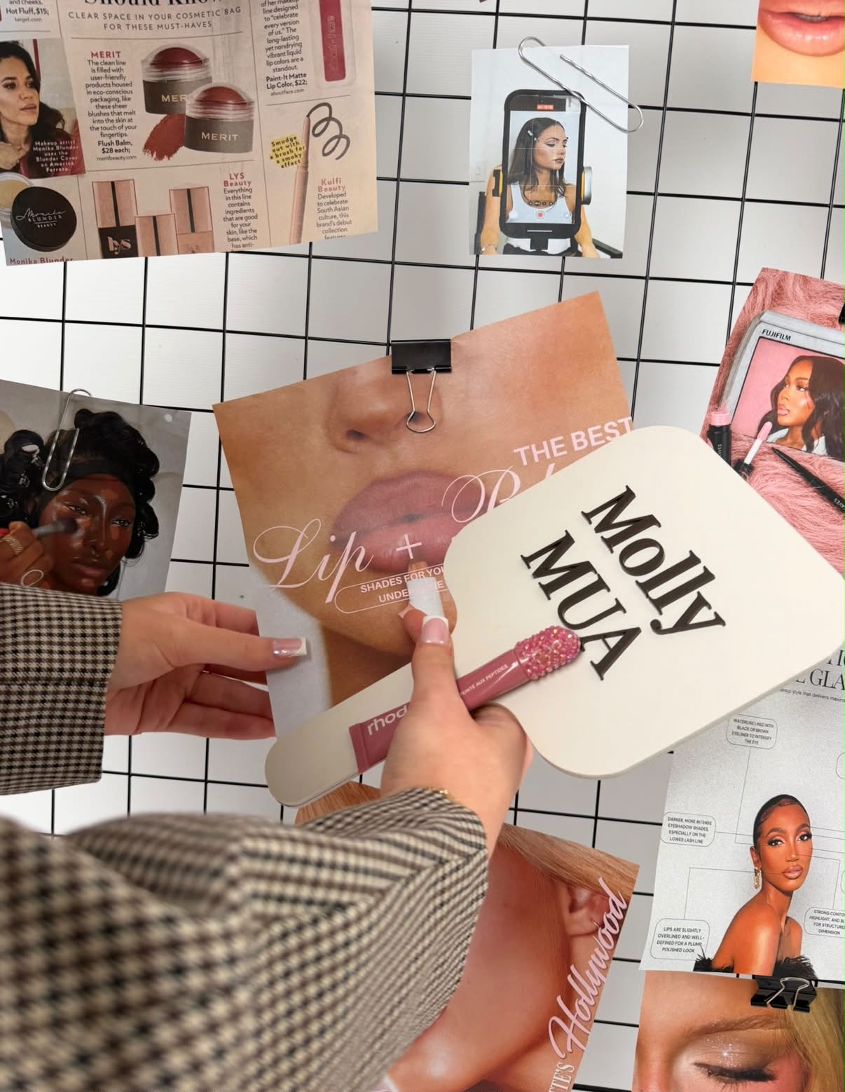 Close-up of the Molly MUA mirror and a sparkly lip tint